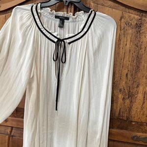 Forever 21 white Blouse with tie Black Accents at neck and wrists.